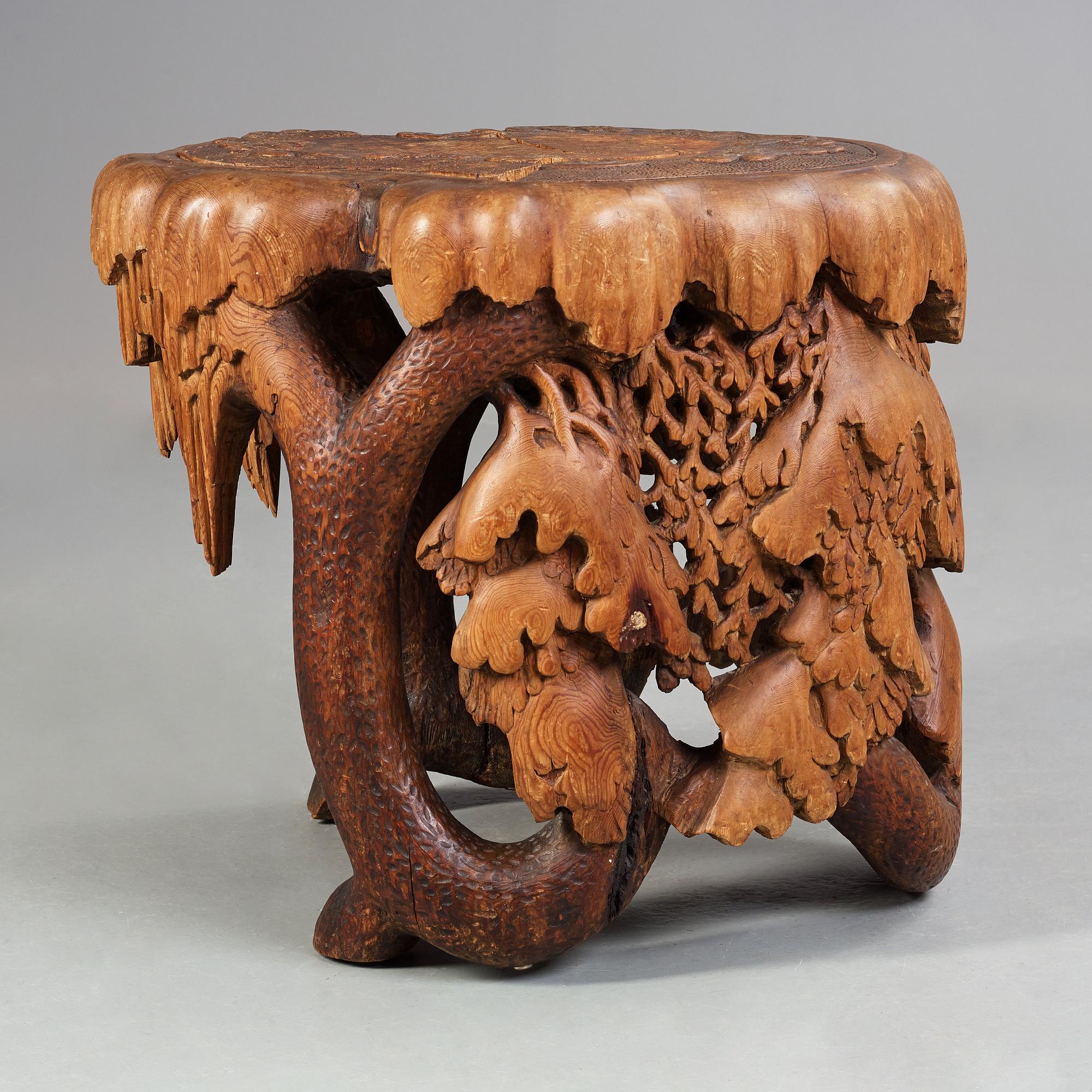 Knut Fjaestad, A Knut Fjaestad Art Nouveau sculptured pine table, Sweden ca 1900.