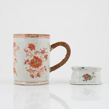 A rouge de fer mug and a famille rose salt, Qing dynasty, 18th Century.