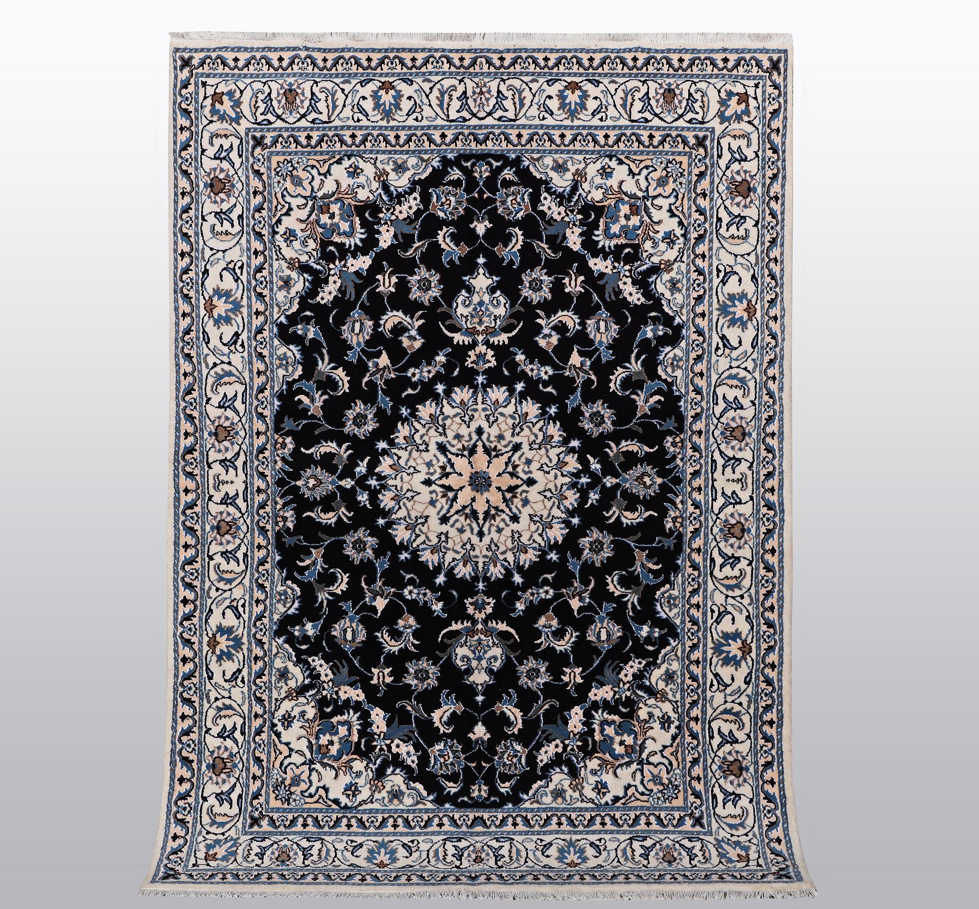 A rug, Nain, part silk, ca 242 x 167 cm.