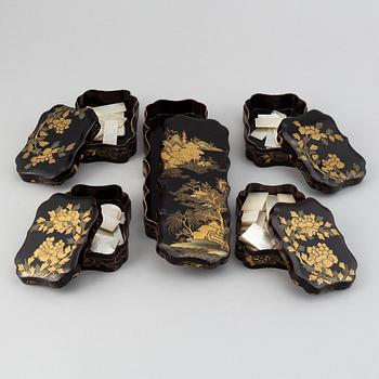 A box containing smaller boxes and mother of pearl chips for games, late Qing dynasty, 19th Century.