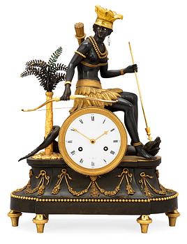 659. A French circa 1800 mantel clock "Au Sauvage, L'Amerique".