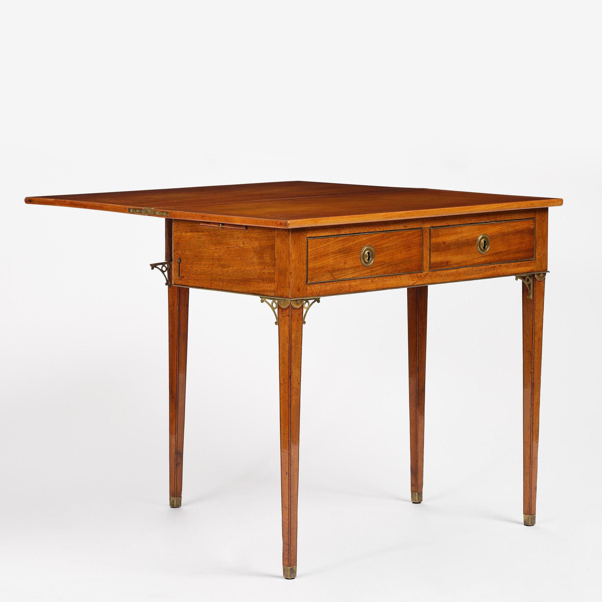 A late Gustavian mahogany games table, presumably by A. Nordström (Journeyman at G. Iwersson 1806-09).