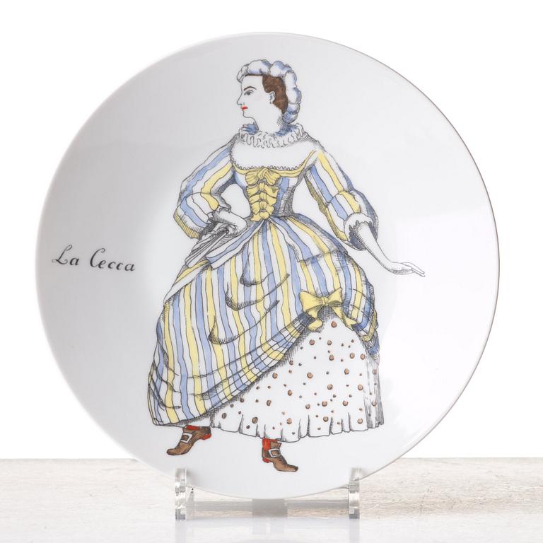 Piero Fornasetti, a set of 12 "Maschere Italiane" porcelain plates, Milan, Italy.