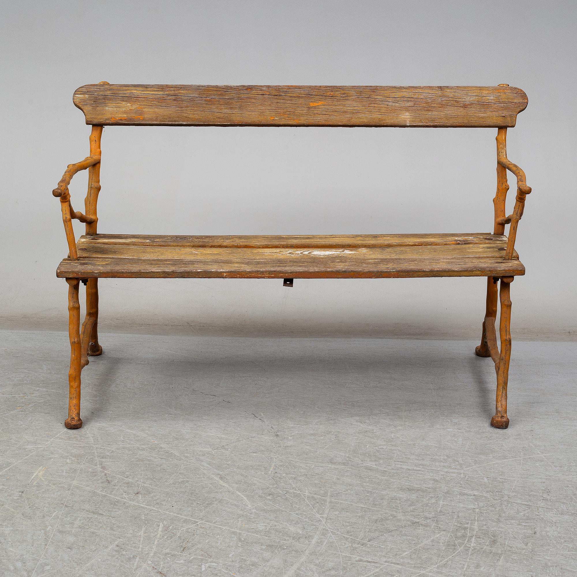 A garden sofa and armchair, Bolinder, Stockholm, circa 1900.