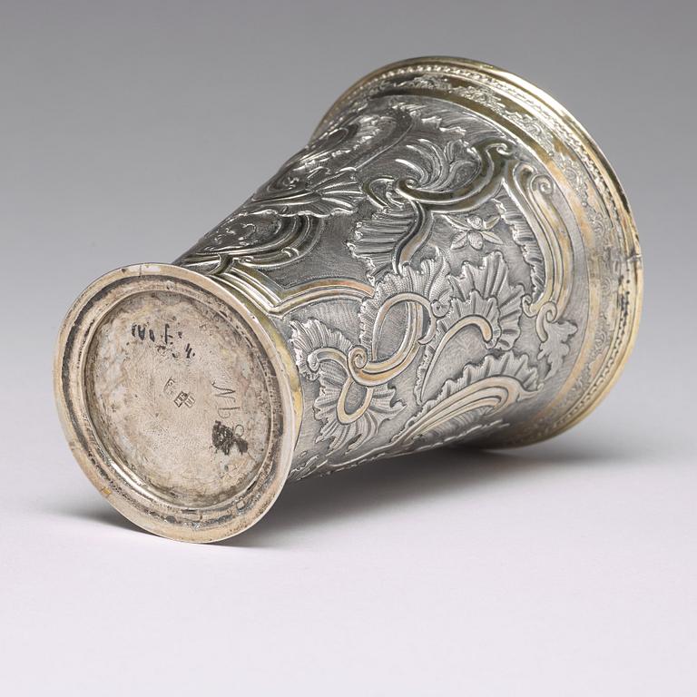 A Russian 18th century parcel-gilt silver beaker and cover, mark of Grigorij Poltow, Moscow (1755-1768).