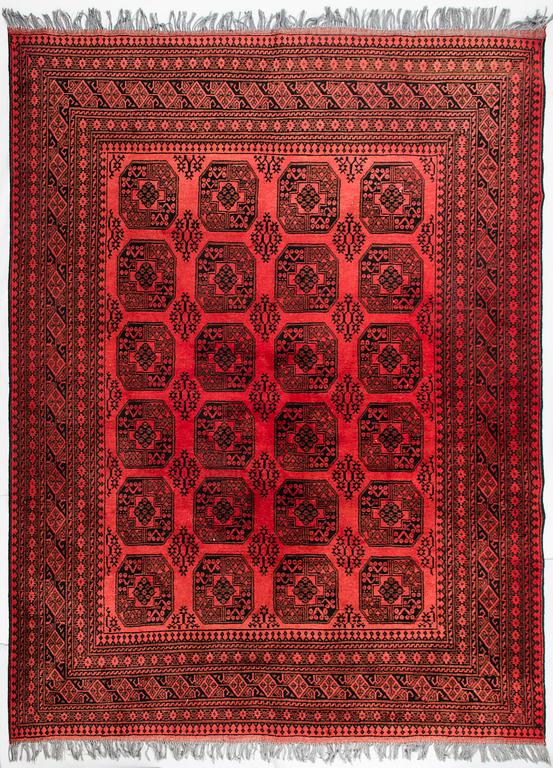 An Afghan carpet, old. Circa 255 x 337 cm.