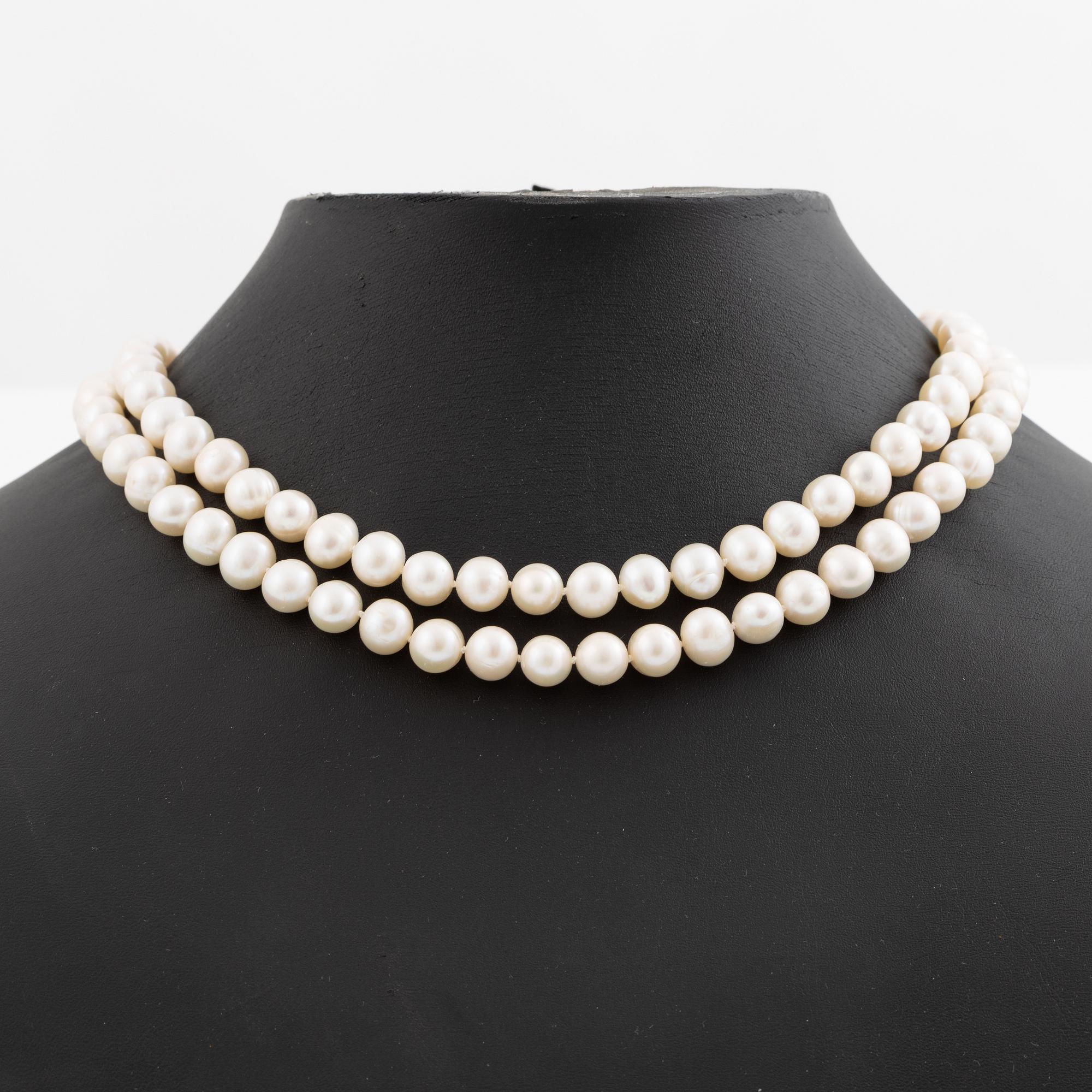 Pearl necklace, double-stranded with cultured freshwater pearls, clasp 18K gold set with aquamarine and cultured pearls, Jarl Sandin.