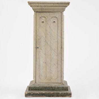 A Swedish column-shaped cabinet 19 th century.