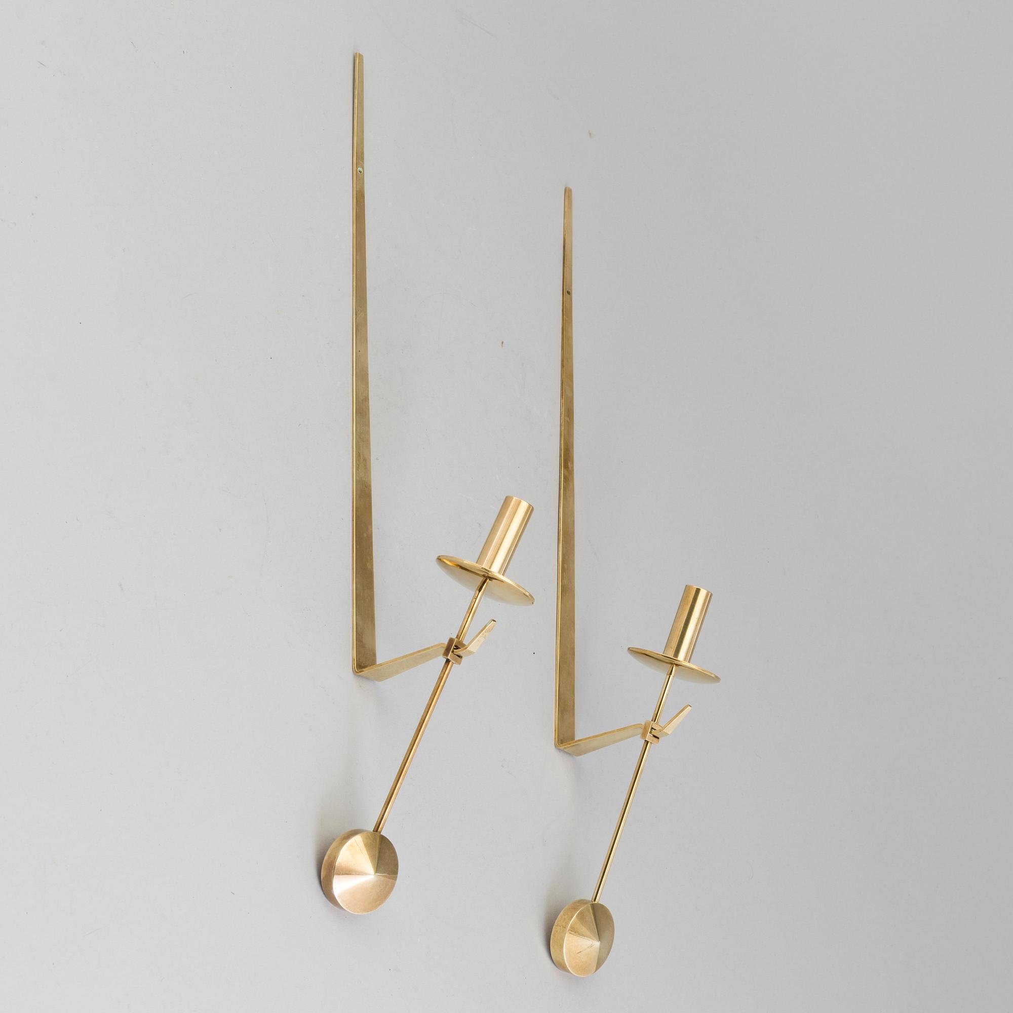 A pair of 20th century brass wall candleholders "Pendel" design Pierre Forssell for Skltuna, Sweden.