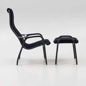 Yngve Ekström, a 'Lamino' easy chair with footstool, Swedese, 2018.