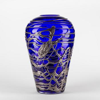 A blue and iridescent glass vase, Bohemian Art Glass, Czech Republic, indistingtly signed.