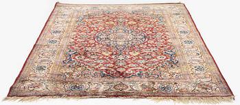 A semi-antique silk Kashan, central Persia, c. 210 x 140 cm.