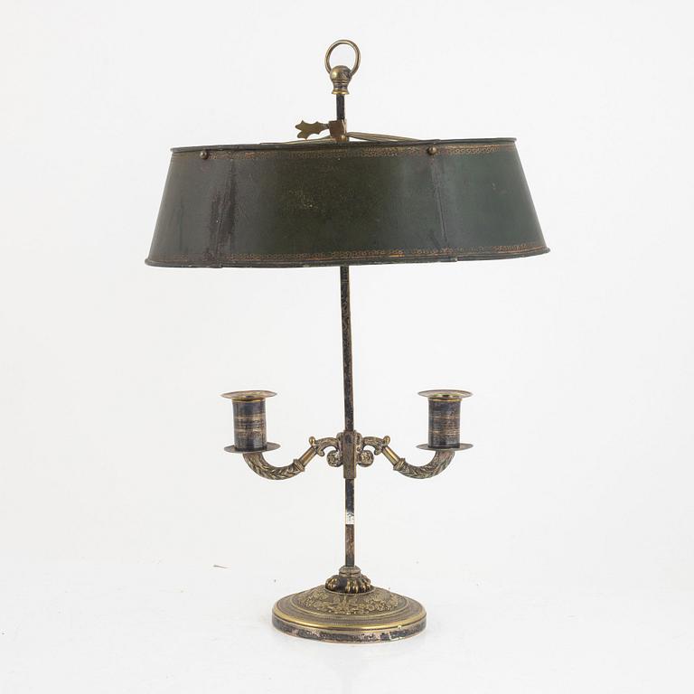 A French Empire silvered-bronze and tôle-peinte two-light reading light, early 19th century.