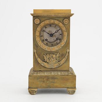 An Empire mantle clock, mid 19th century.