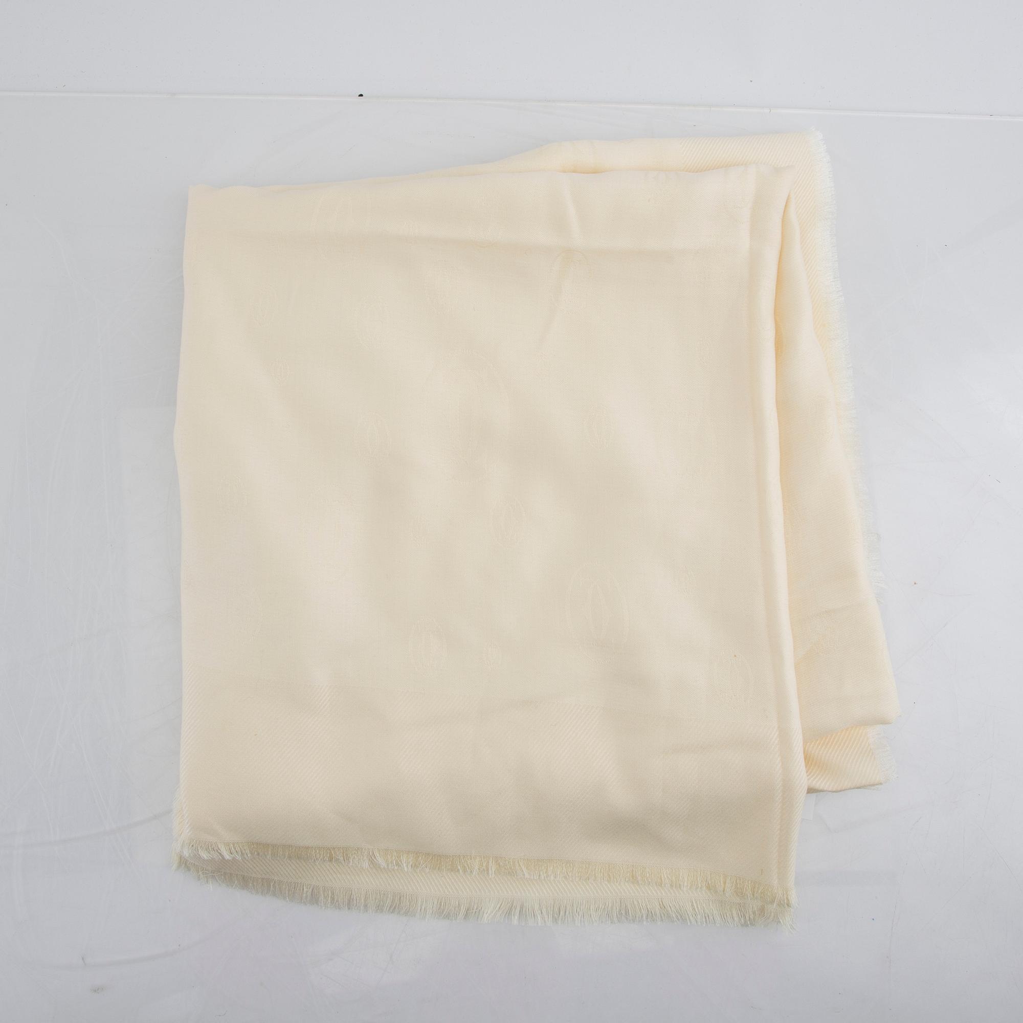 Cartier, a wool/silk scarf.