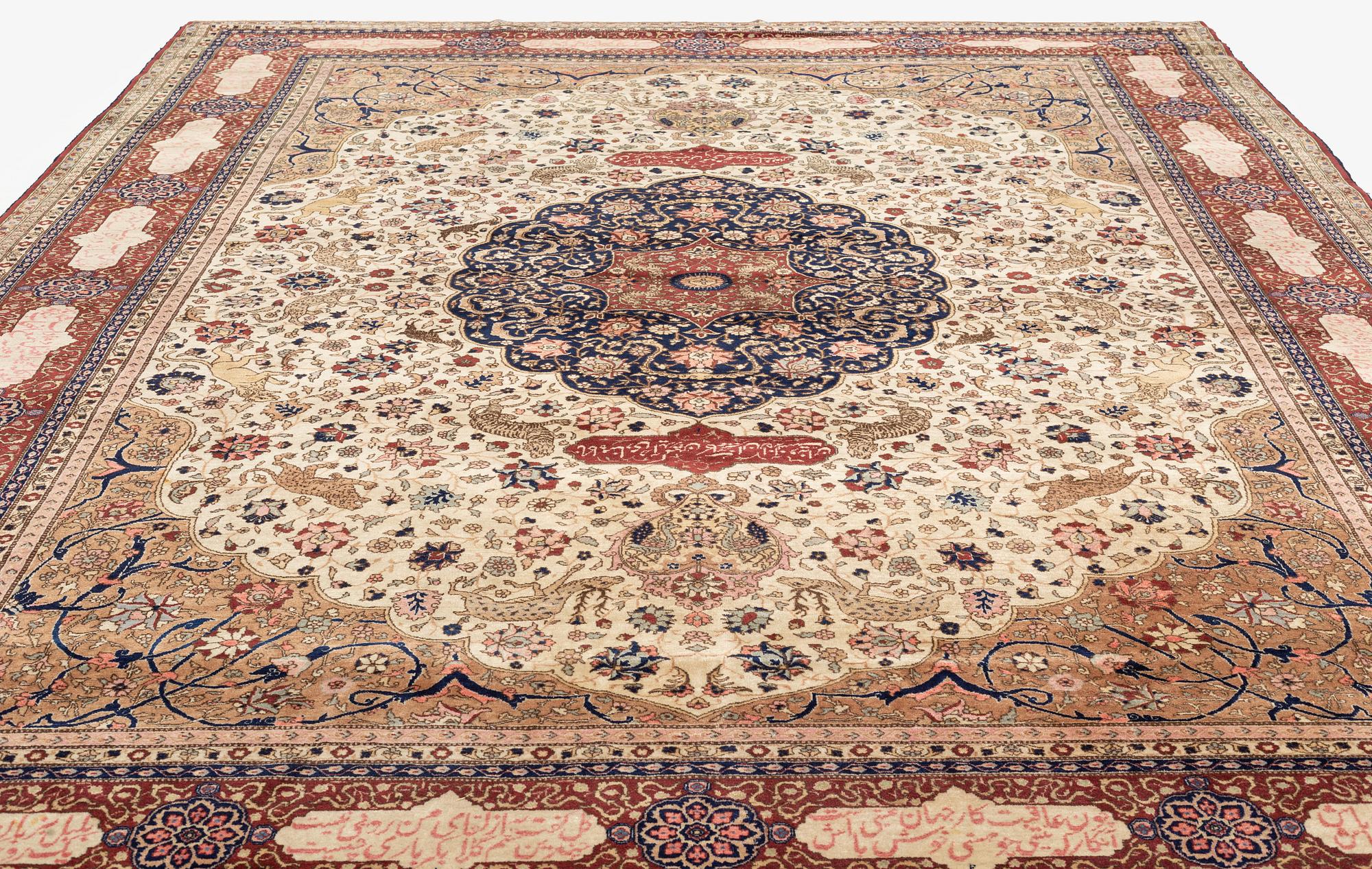 An antique Benlian Tabriz carpet, signed Jabarzade, ca 466 x 323 cm.