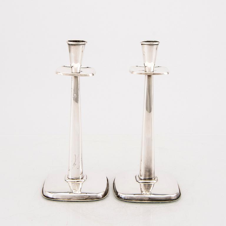 A Swedish 20th century pair of sivler candle sticks mark of Tesi Gothenburg 1959.