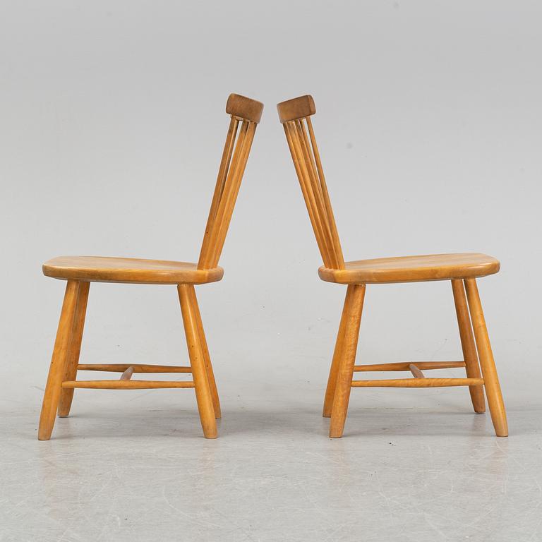 A set of eight 'Lilla Åland' birch chairs by Carl Malmsten for Stolab dated 1996.