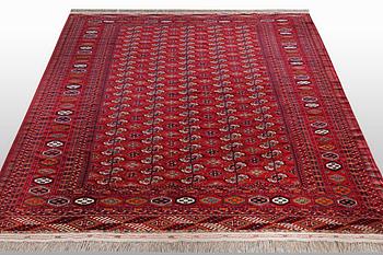 A carpet, semi-antique Tekke, ca 330 x 250 cm.