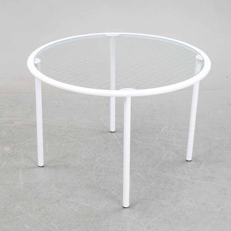 Giandomenico Belotti, attributed to, a griddled glass and metal dining table, by Fly Line, Italy, 1970s.