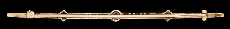 BROSCH, 14k guld samt platina med gammal- och rosenslipade diamanter, mittsten ca0,25ct. Vikt 6g.