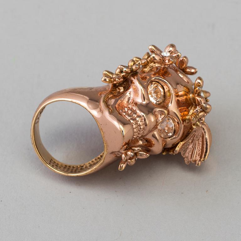 a ring by Alexande McQueen.