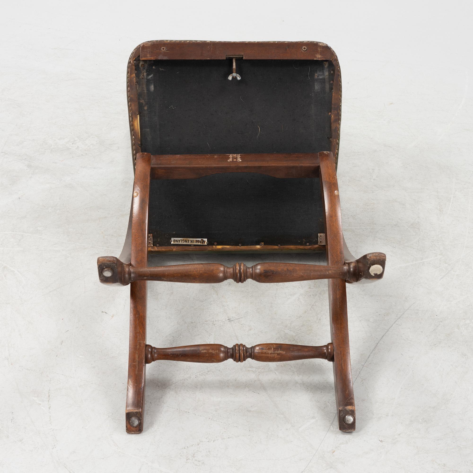 A set of five mahogany and leather upholstered chairs, England, second half of the 20th Century.