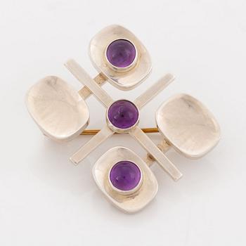 Arvo Saarela, silver and cabochon cut amethyst brooch.