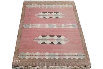 A flat weave carpet, signed GG, c. 190 x 133 cm.