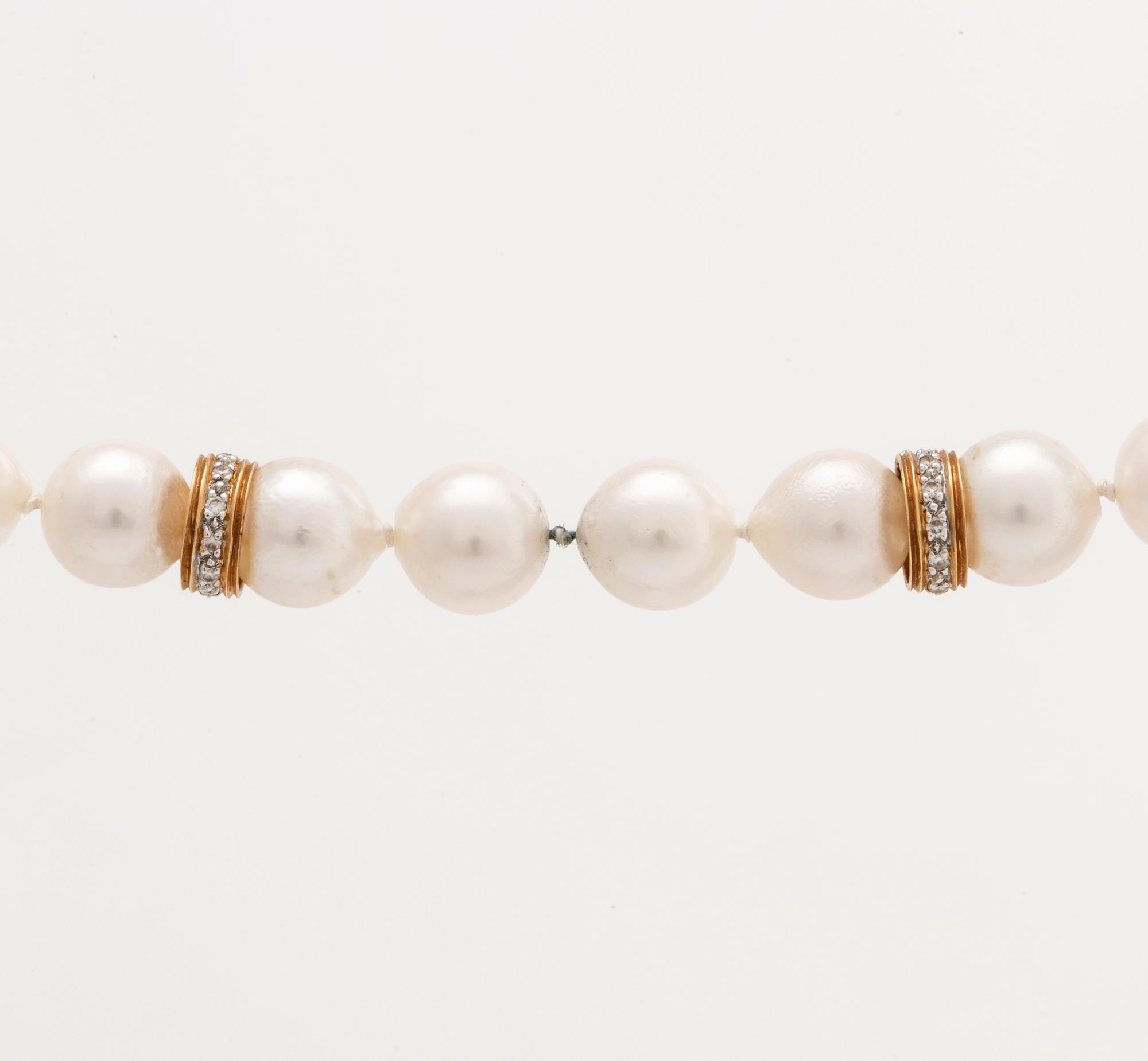 PEARL NECKLACe, cultured pearls 7,5-8 mm, clasp 18K gold diamonds and spacers 18K gold and diamonds 0,60 ct in total.