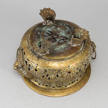 An 18th century brass flower pot.