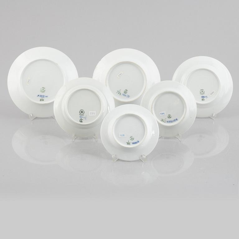 A group of eleven 'Blue Fluted Plain' /'Musselmalet' porcelain dishes and plates, Royal Copenhagen, 1893-1923 and later.