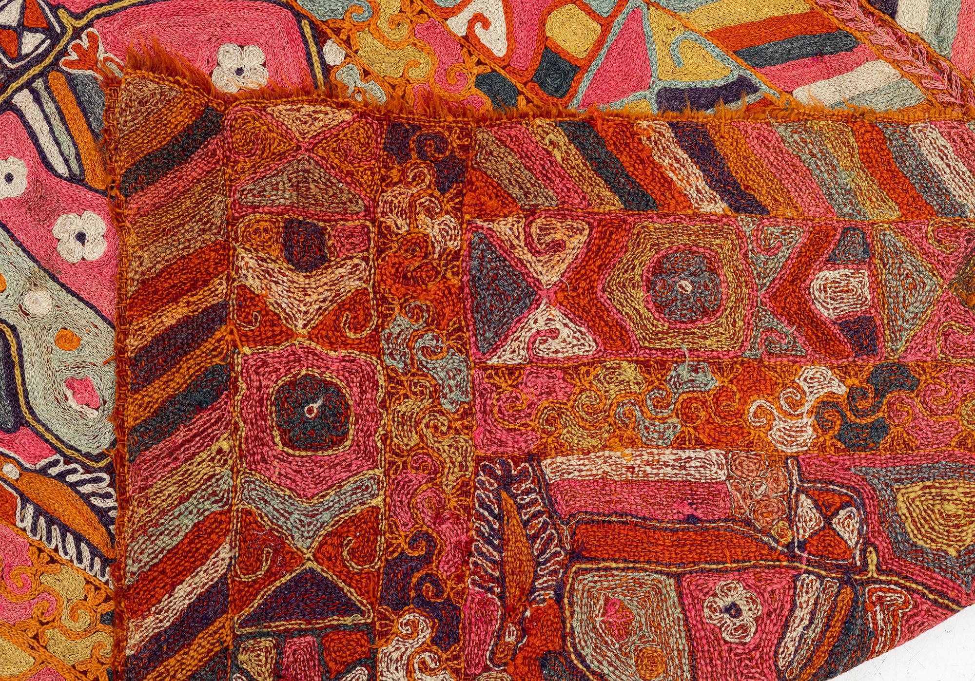 A semi-antique textile with embroideries, nomads, Iraq, c. 245 x 170 cm.