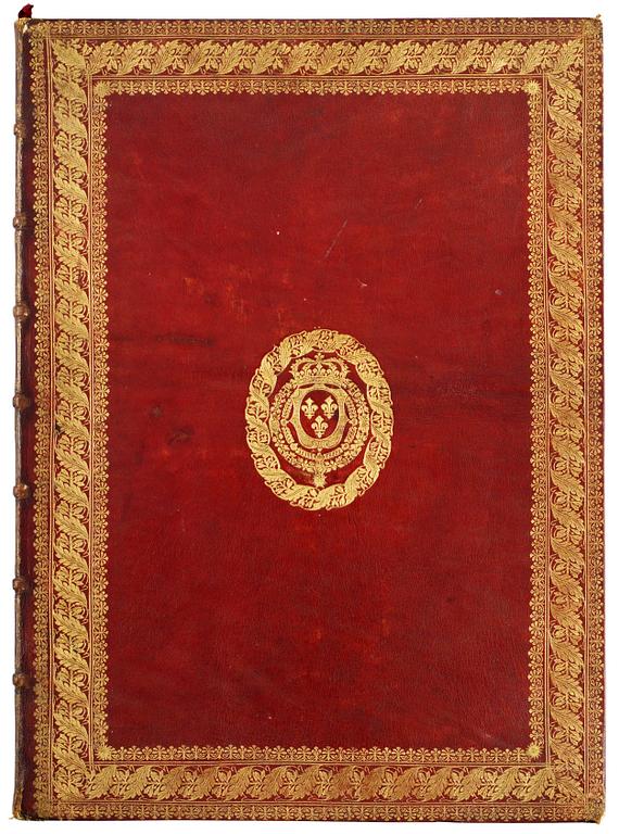 A Louis XIV leather-bound book cover.
