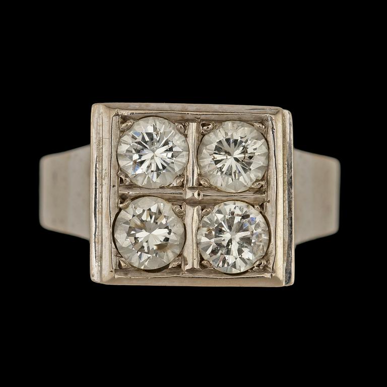 RING, 18k vitguld med 4 briljantslipade diamanter, tot 1.6 ct, Gunnar Alp, Stockholm, 1973. Vikt 7 g.