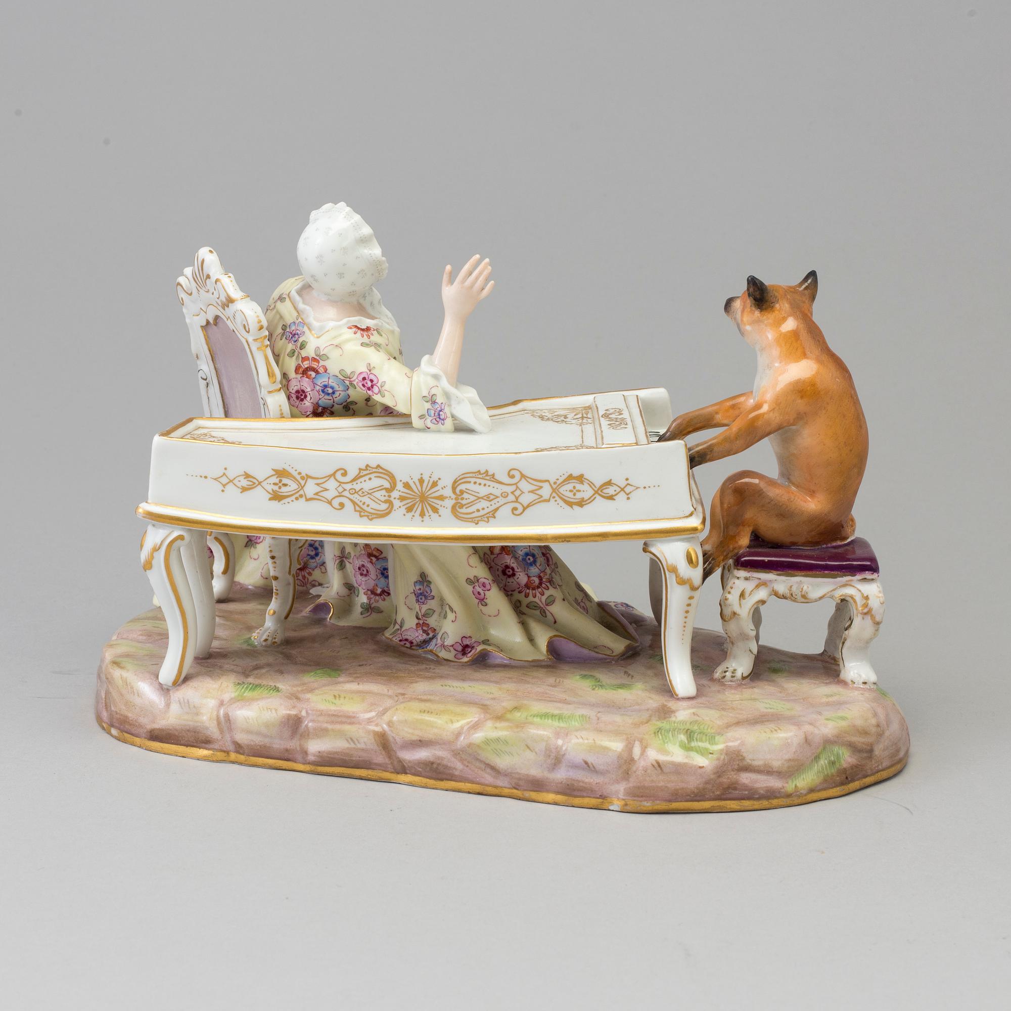 A Meissen figure group, late 19th Century. Not first quality.