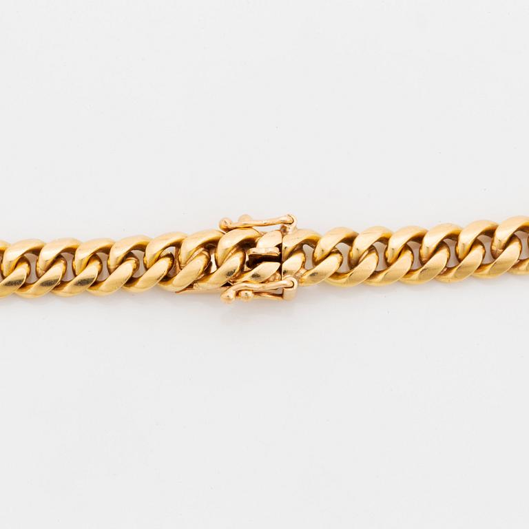 An 18K gold necklace by Jan Hellströmer.