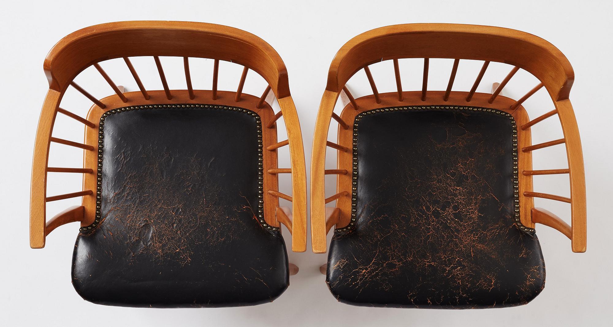 Josef Frank, a pair of mahogany and black leather 'Captain's chair', Svenskt Tenn, model 789B, acquired in 1950.