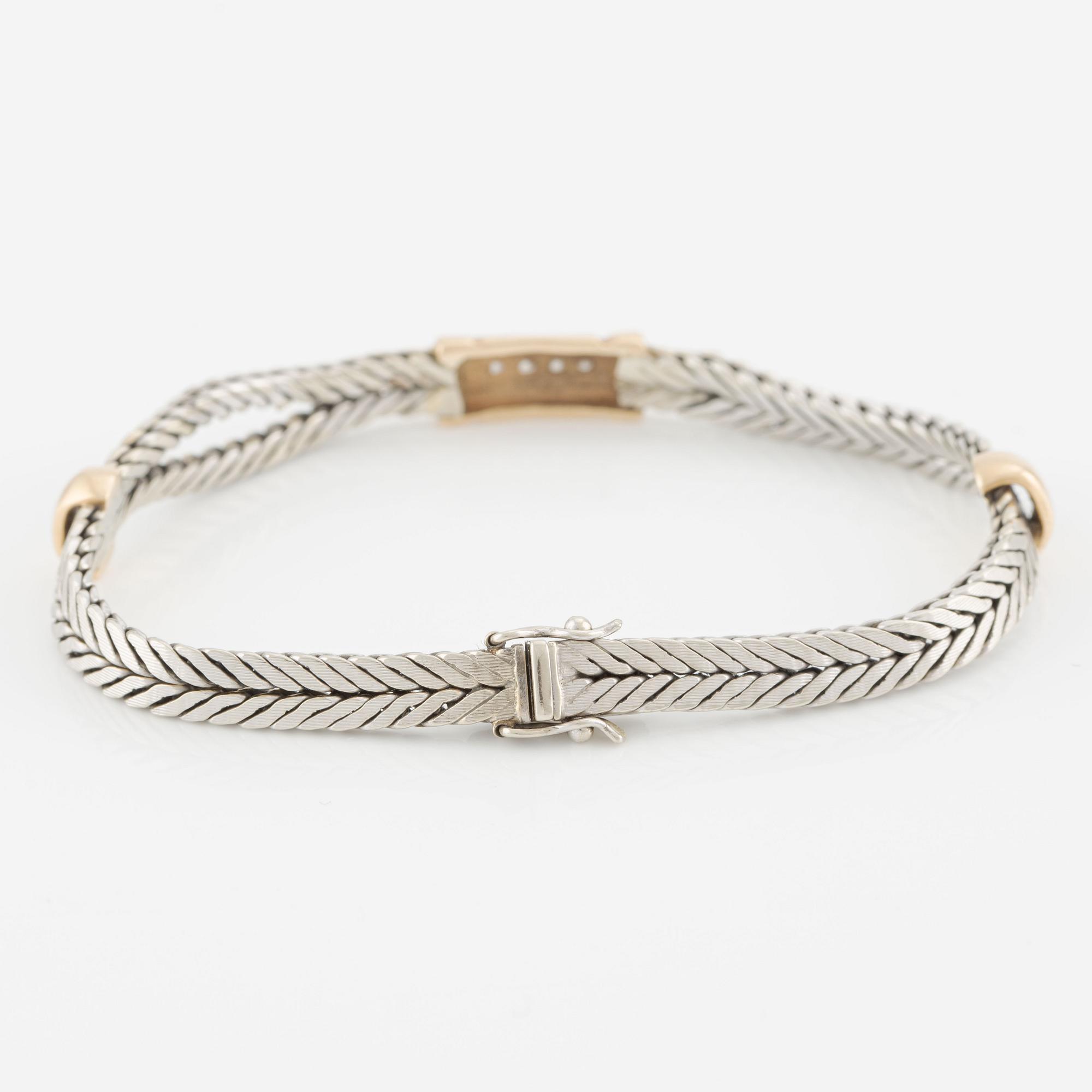 Armband, 18K guld och vitguld med briljantslipade diamanter.