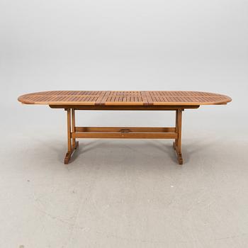 A 9 pcs stained teak garden suite by Brafab around 2000.