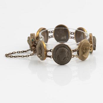 Lava stone cameo gold brooch and bracelet.