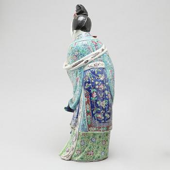 A porcelain figurine from China, late 19th or early 20th century.