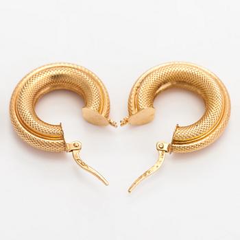 A pair of 14k gold earrings. Italy.