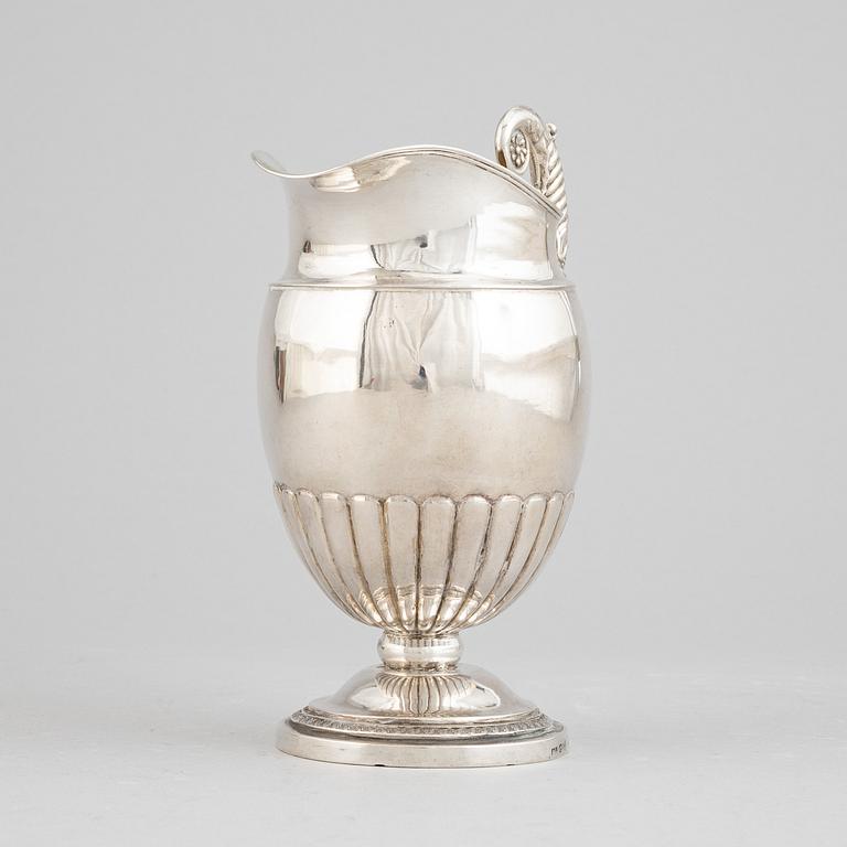 A Swedish empire parcel gilt silver creamer, mark of Anders Lundqvist, Stockholm 1828.