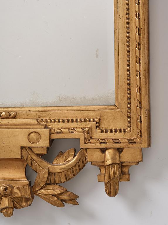 A Gustavian Giltwood mirror by J. Åkerblad and A. Öberg, Stockholm, 1780's.