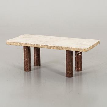 A late 20th century travertine and marble lounge table.