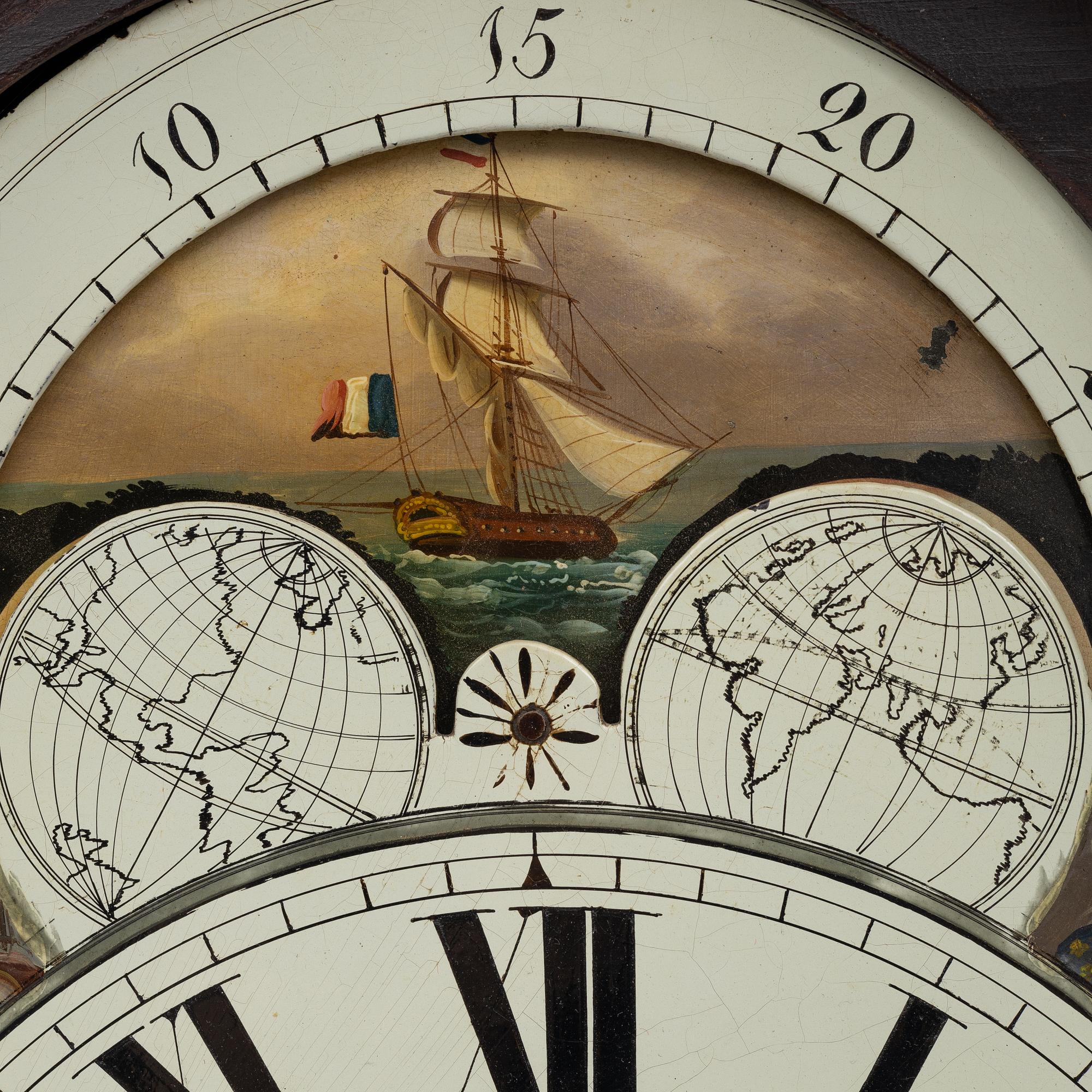 A long-case clock, England, 19th century.