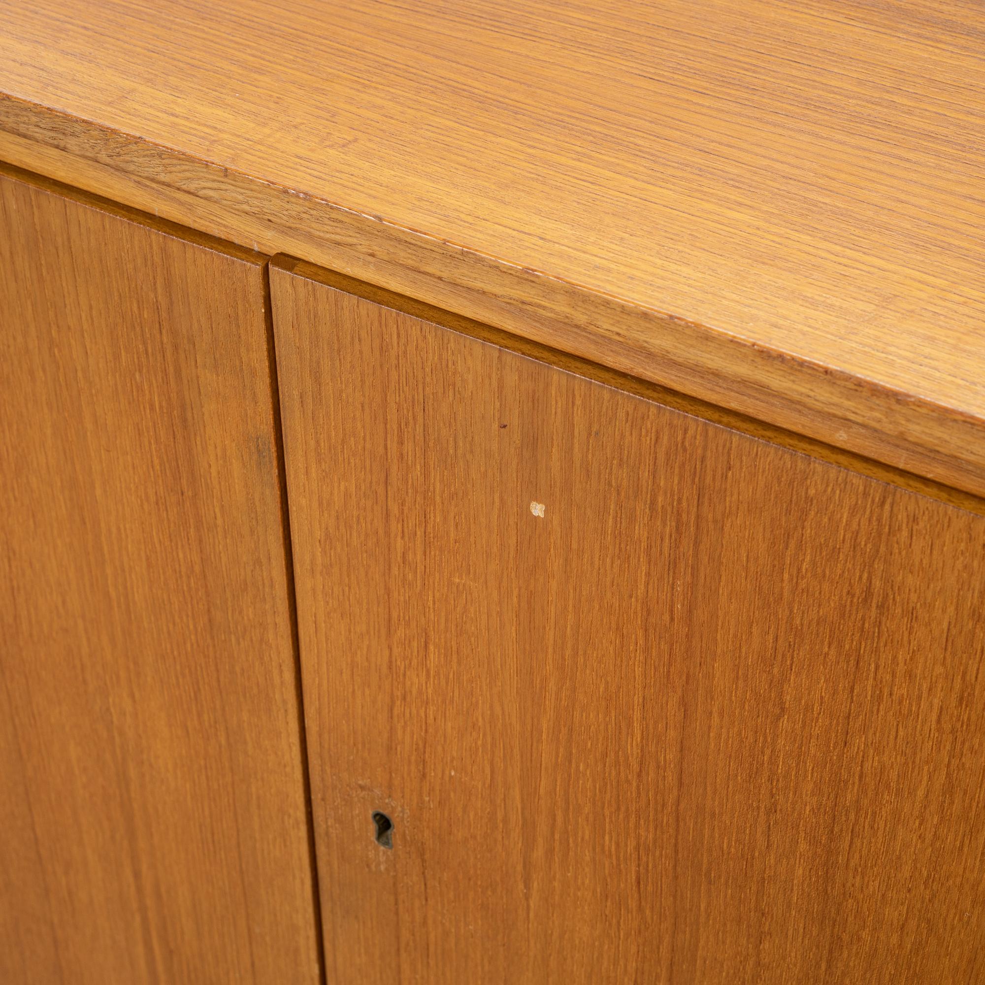 A 1950's/60's teak cabinet.