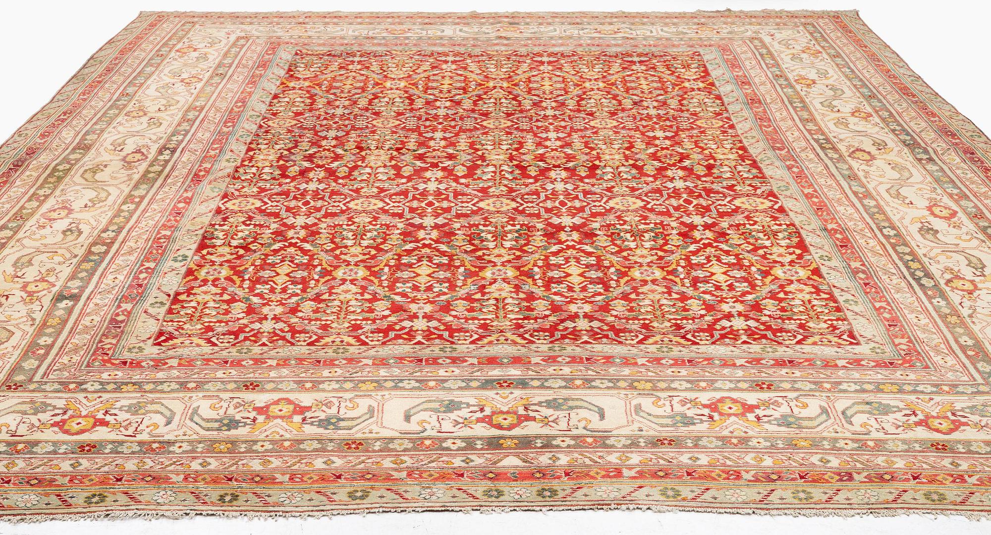 An antique Agra carpet, North India, c. 470 x 370 cm.