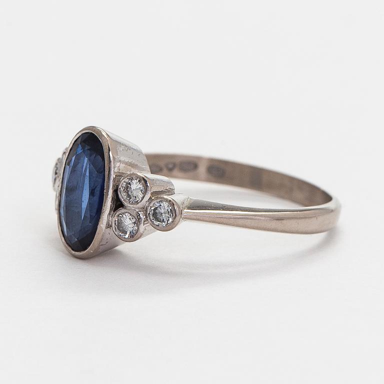 A. Tillander, ring, faceted sapphire, brilliant cut diamonds, 18K white gold, Helsinki 1983.